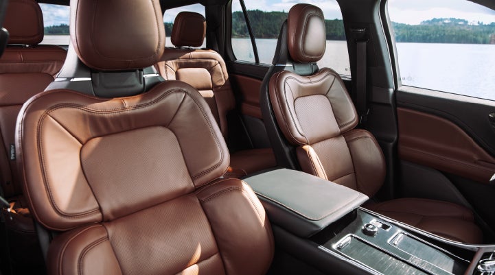 The front row's Perfect Position Seats in a 2024 Lincoln Aviator® Reserve model with Ebony Roast interior | Libertyville Lincoln Sales, Inc. in Libertyville IL