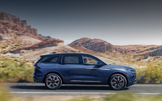 A 2024 Lincoln Nautilus® SUV is being driven in a desert setting. | Libertyville Lincoln Sales, Inc. in Libertyville IL