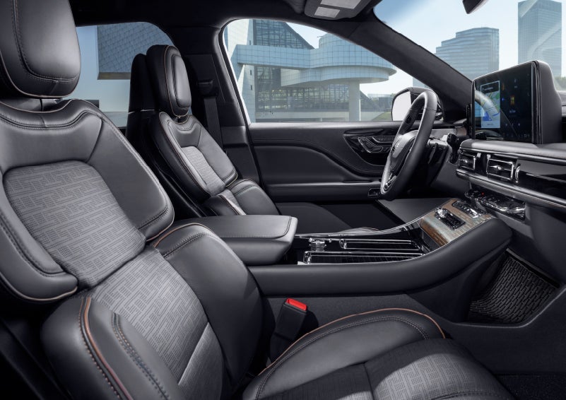 The interior of the 2025 Lincoln Aviator® SUV is shown with sleek black accents. | Libertyville Lincoln Sales, Inc. in Libertyville IL