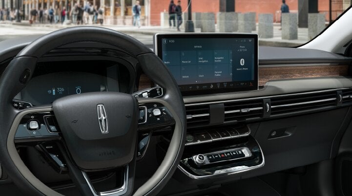 The center screen of the new 2025 Lincoln Corsair® SUV is showcased with its SYNC® 4 capabilities highlighted | Libertyville Lincoln Sales, Inc. in Libertyville IL
