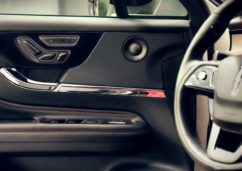 The driver of a 2024 Lincoln Corsair® SUV is shown selecting the drive mode. | Libertyville Lincoln Sales, Inc. in Libertyville IL