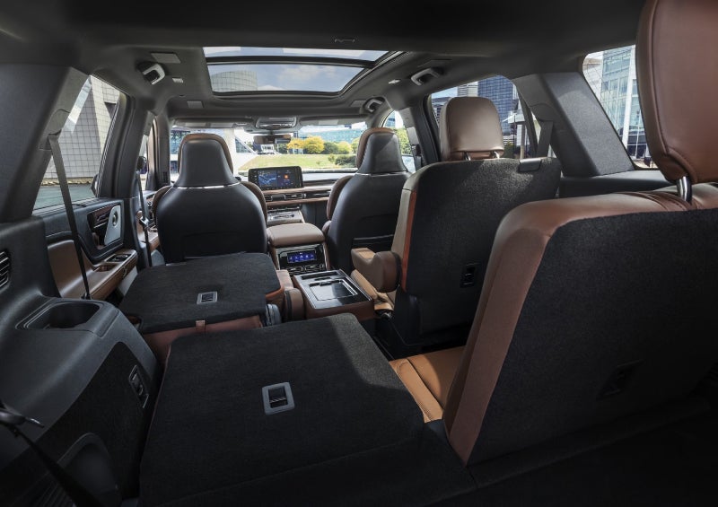 One side of the PowerFold® third-row seat and a second-row seat are folded forward in the 2026 Lincoln Aviator® SUV. | Libertyville Lincoln Sales, Inc. in Libertyville IL