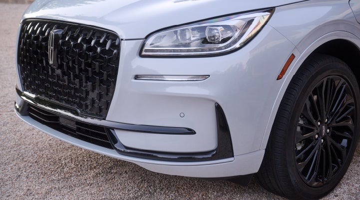 The all-black grille of the available Jet Appearance Package on a 2026 Lincoln Corsair® SUV is shown. | Libertyville Lincoln Sales, Inc. in Libertyville IL