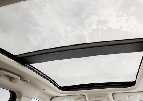 : The available panoramic Vista Roof® is shown from inside a 2026 Lincoln Corsair® SUV. | Libertyville Lincoln Sales, Inc. in Libertyville IL